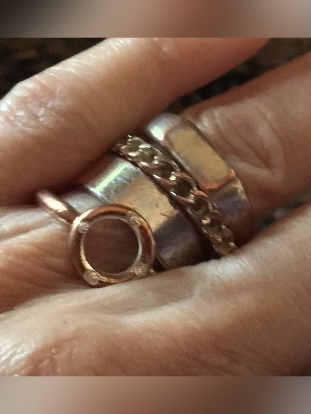 Nordstrom set of 4 stacking rings. Size 8. 3 like new 1 a little tarnished.